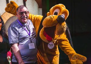 man with Disney character