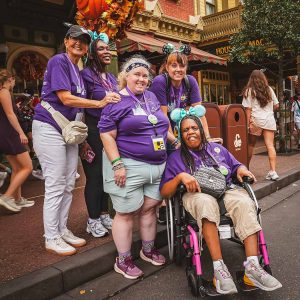 people with disabilities walking around Disney World