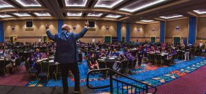 man addressing a crowd of people