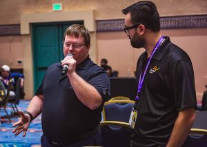 man talking into microphone