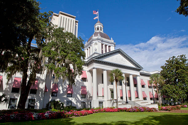 The old Florida State Capitol building as seen from Monroe St and Apalachee Parkway with the New Capitol in the background